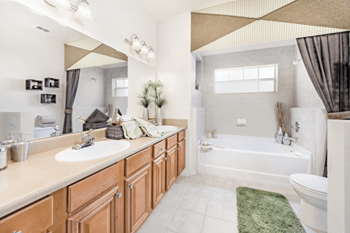 Ceramic tile flooring in the kitchen and bathrooms