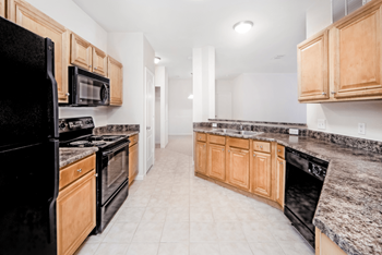 Ceramic tile flooring in the kitchen and bathrooms