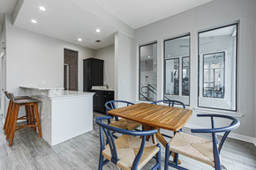 Houston apartment for rent - clubhouse lounge area with a table and chairs
