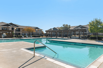 Poolside picnic area with pergola