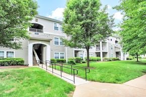 Warrenton apartment for rent - Apartment complex with a walkway in front.