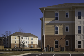 Waldorf apartment for rent - a row of three story apartment buildings with a blue sky in the background