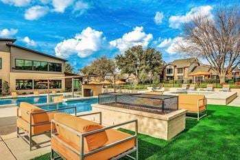 Three outdoor lounges with firepits and seating