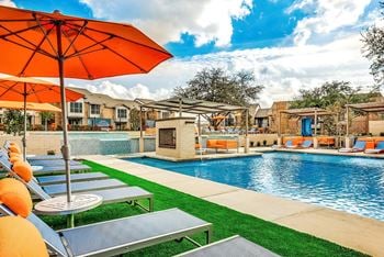 Three swimming pools with poolside firepits