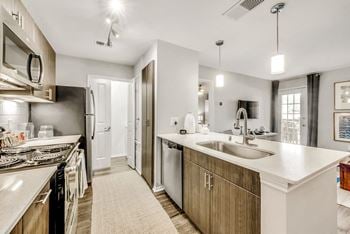 Goose neck sink faucet with sprayer