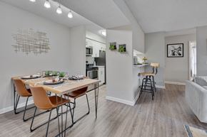 Raleigh apartment for rent - A dining room with a table set for four.