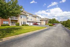 Louisville apartment for rent - a street with houses on either side of a road