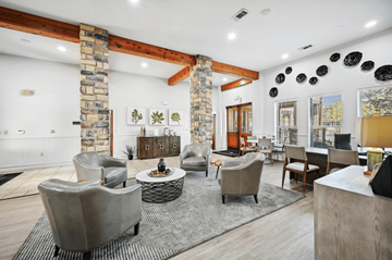 Dallas apartment for rent - a living room with couches and chairs and a fireplace