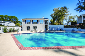 La Grange apartment for rent - A swimming pool in front of a house.