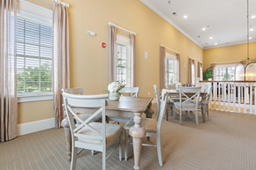 Wilmington apartment for rent - A dining room with a table set for four.