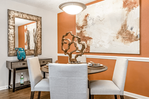 Matthews apartment for rent - A dining room with a table and chairs at Paces Pointe Apartment Homes, Matthews, North Carolina