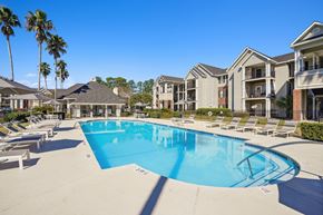 Brunswick apartment for rent - A large swimming pool in front of apartment buildings.