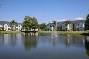 Vero Beach apartment for rent - Waterfront View with Apartment Building Exterior and Trees