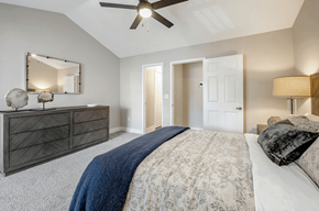 Aventura apartment for rent - A bedroom with a large bed and a ceiling fan.