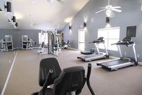 Clermont apartment for rent - A gym with treadmills, elliptical machines, and other exercise equipment.