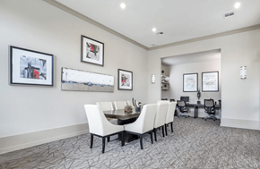 Mansfield apartment for rent - Resident conference area with long table facing the resident business center computers