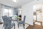 Raleigh apartment for rent - A dining room with a table set for four at Regency Park Apartment Homes, Raleigh