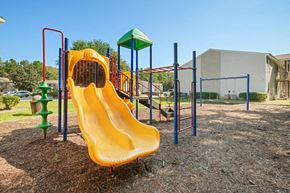 St. Marys apartment for rent - a mulched playground with a yellow slide