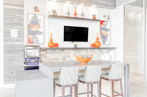 Durham apartment for rent - a kitchen with a center island and four stools in front of a kitchen counter