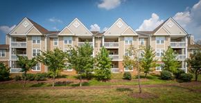 Waldorf apartment for rent - an apartment complex with trees in front of it