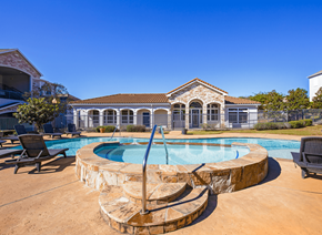 Tyler apartment for rent - Heated spa and pool featuring the community clubhouse