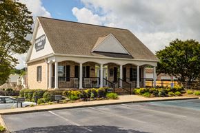 Mauldin apartment for rent - Leasing office with columns and greenery