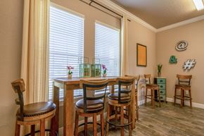 Plant City apartment for rent - A dining room with a table and chairs.