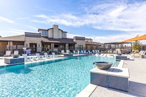 Burleson apartment for rent - A large swimming pool with a bowl in the middle of it.