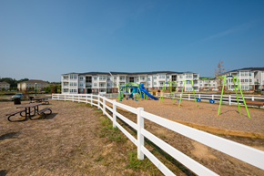 Waldorf apartment for rent - playground with white fence surrounding it