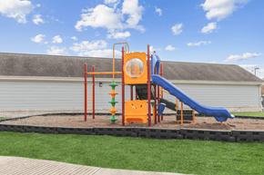 Pasadena apartment for rent - A playground with a blue slide and orange play structure.