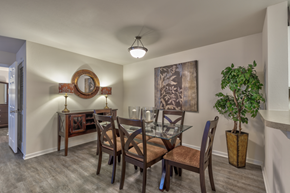 Nashville apartment for rent - A dining room with a glass table and chairs.