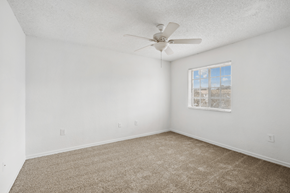 Fort Lauderdale apartment for rent - an empty room with carpet and a ceiling fan