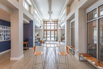 Murfreesboro apartment for rent - A modern dining room with a round table and chairs.