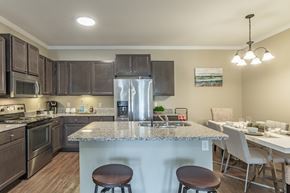 Murfreesboro apartment for rent - A kitchen with a granite countertop and stainless steel appliances.