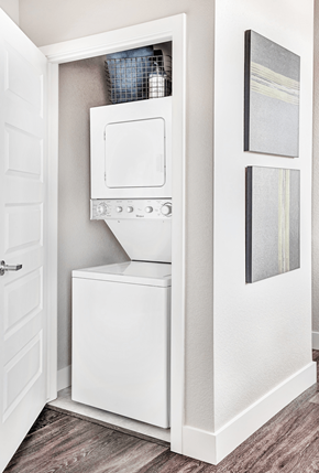 Denver apartment for rent - A white built in dishwasher and oven in a kitchen.