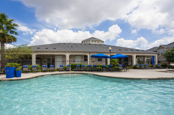 Resort-style swimming pool with sundeck
