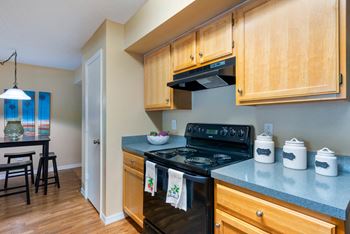 Light oatmeal color wood cabinetry