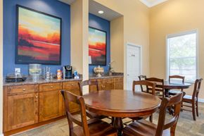 Jacksonville apartment for rent - Clubhouse Seating Area with Art and Blue Accents