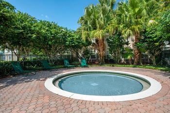 Lakeside pool and wading pool with sundeck seating