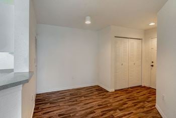 Hardwood style flooring in kitchen and bathrooms