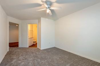 Multi-speed ceiling fans with lighting