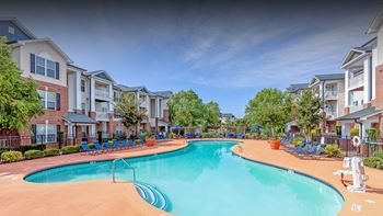 Resort style pool with sun deck