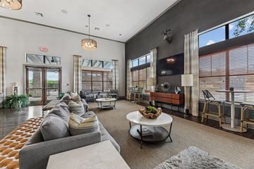 Austin apartment for rent - A living room with a grey sofa and a coffee table.