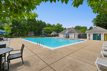 Swimming pool with tanning deck