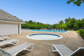 Swimming pool with tanning deck
