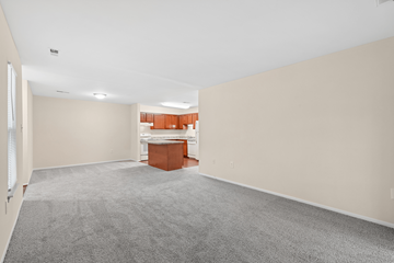 Waldorf apartment for rent - A room with a grey carpet and a white ceiling.