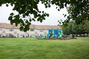 Stafford apartment for rent - playground area in between buildings.