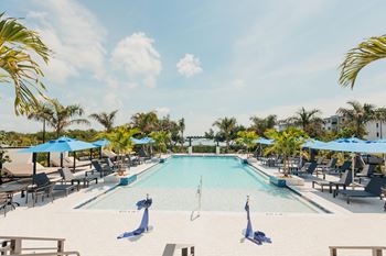 Resort style swimming pool with cabanas