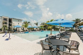 Resort style swimming pool with cabanas
