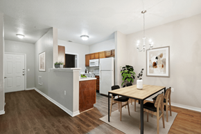 Austin apartment for rent - A kitchen with a table and chairs in the middle of the room.